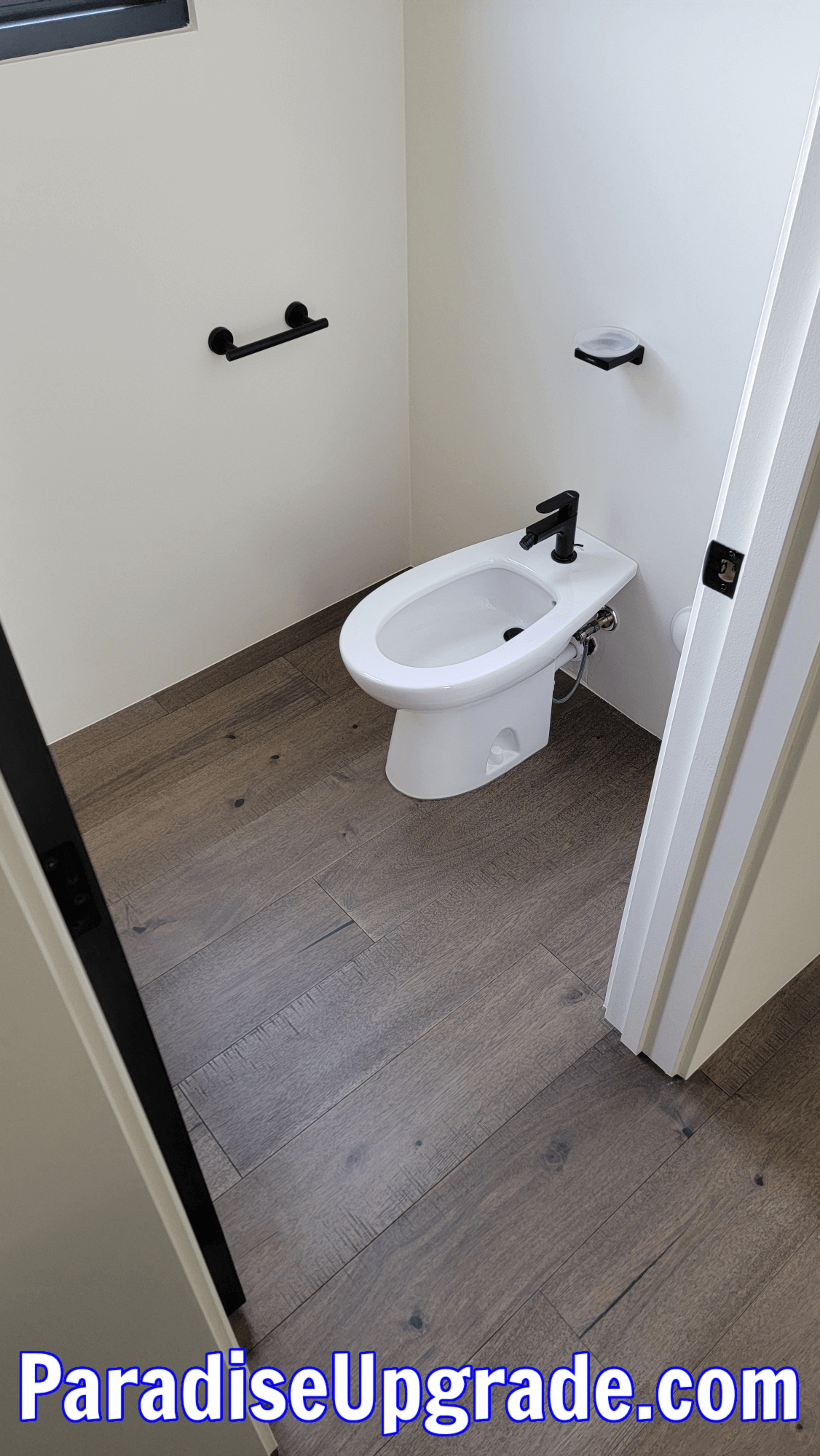 Desert Mountain - bidet installed in the toilet room opposite of the toilet which also has a remote-controlled washlet.