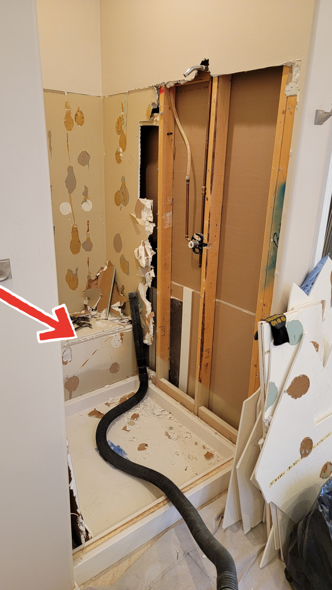 Old shower demolition and removal. Old shower demolition and removal.